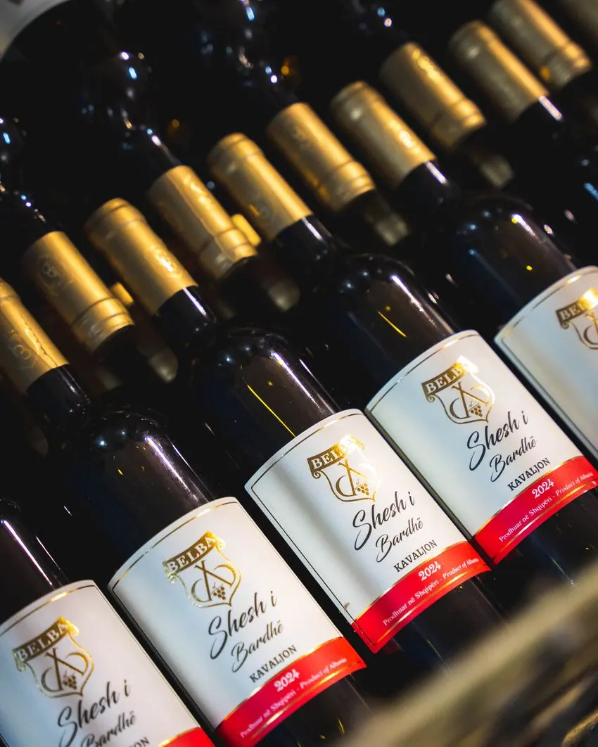 Rows of Belba wine bottles